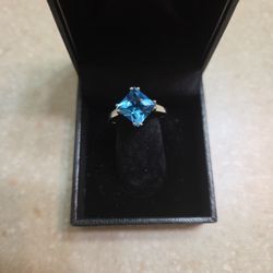 14 K White Gold Ring With Topaz.  Weight Is 2.9 Grams 