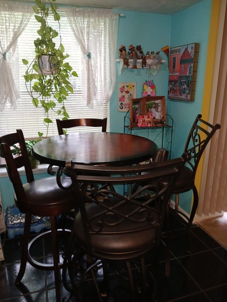Pier 1 Furniture.  Bar Height Table and 4 Stools