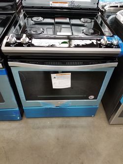Whirlpool gas slide in range with manufacturer's warranty b