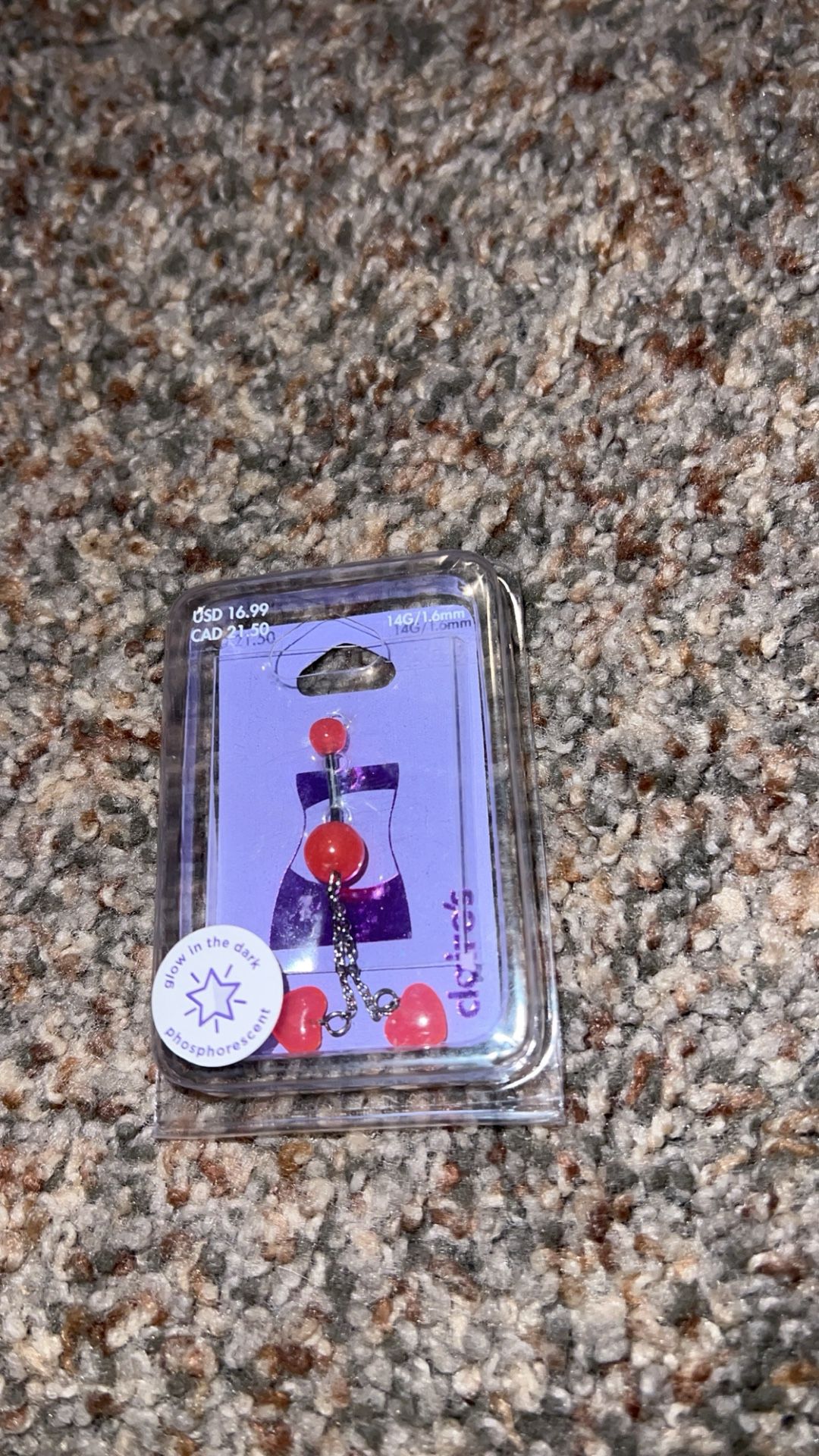 Claire’s Pink Glow in the dark belly ring