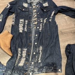 Gabardina vaquera larga con agujeros rotos de Chouyatou