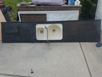 Corian counter kitchen top with faucet and sink