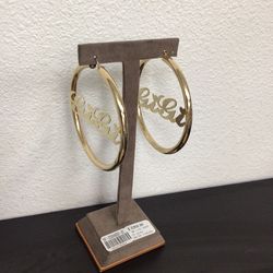 A 10K Pair Of Gold Nameplate Hoop Earrings