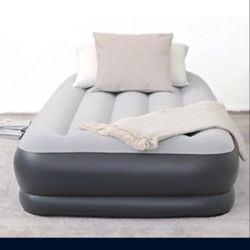 Durable Inflatable Air Mattress with Built-in Pump, Pillow, and USB Charger.
Weight Capacity 330 lbs,
Dimensions:  L 75" x W 38"x H 15"