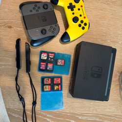 Nintendo Switch with games and two Controllers 