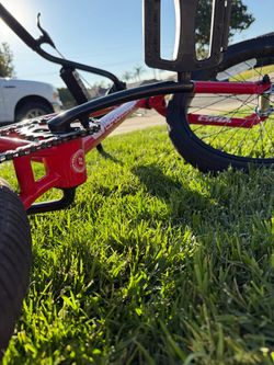 Red pay dirt BMX bike 20’