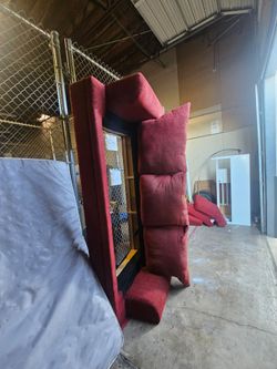 Red sofa bed comes with everything just needs a cleaning
