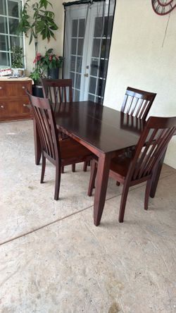 Wooden dining table and 4 Chairs