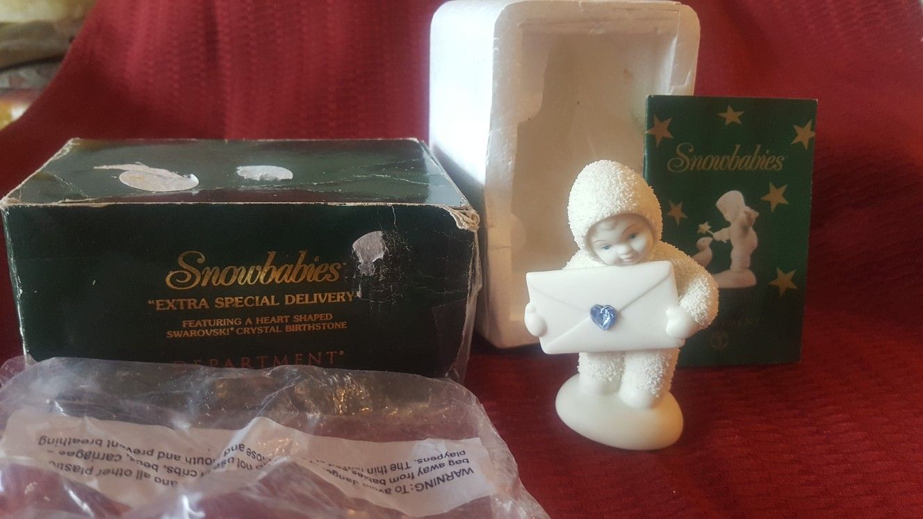 Snow baby 2000 extra special delivery aquamarine stone