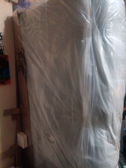 Sofa still in plastic