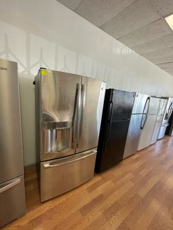 Black GE top freezer