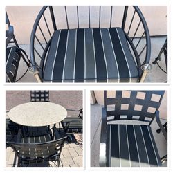 Commercial grade rot iron patio furniture with granite table tops