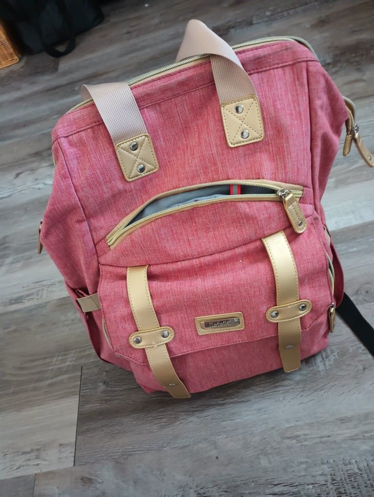 Pink Diaper Bag And Baby Girl Clothes Newborn And 0 To 3