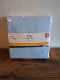 New, never opened full size sheet set