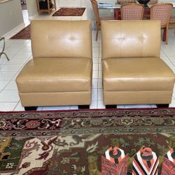 Two Leather Chairs