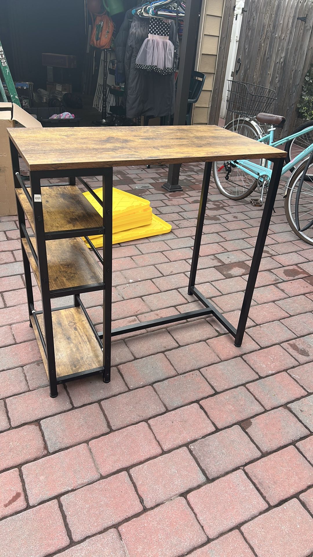 Table with storage shelves