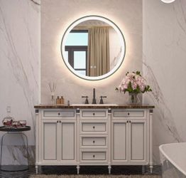 Brand new round LED bathroom mirror in original box.