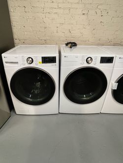 New LG electric washer and dryer; includes a 90-day warranty on the receipt.