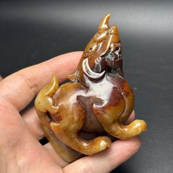 The divine beast hand-held charm brings good luck. It is a magical stone.