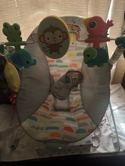 New born diapers and bouncer