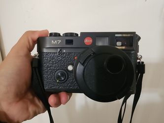 Leica M7 with lens and speed light flash