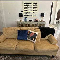 2 separate beige couches 