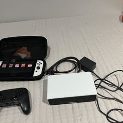 OLED Nintendo Switch with games