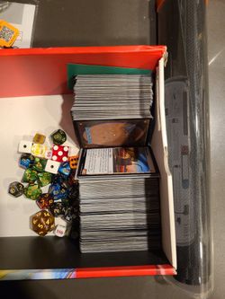 Magic cards dice and a mat