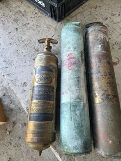3 antique brass fire extinguishers