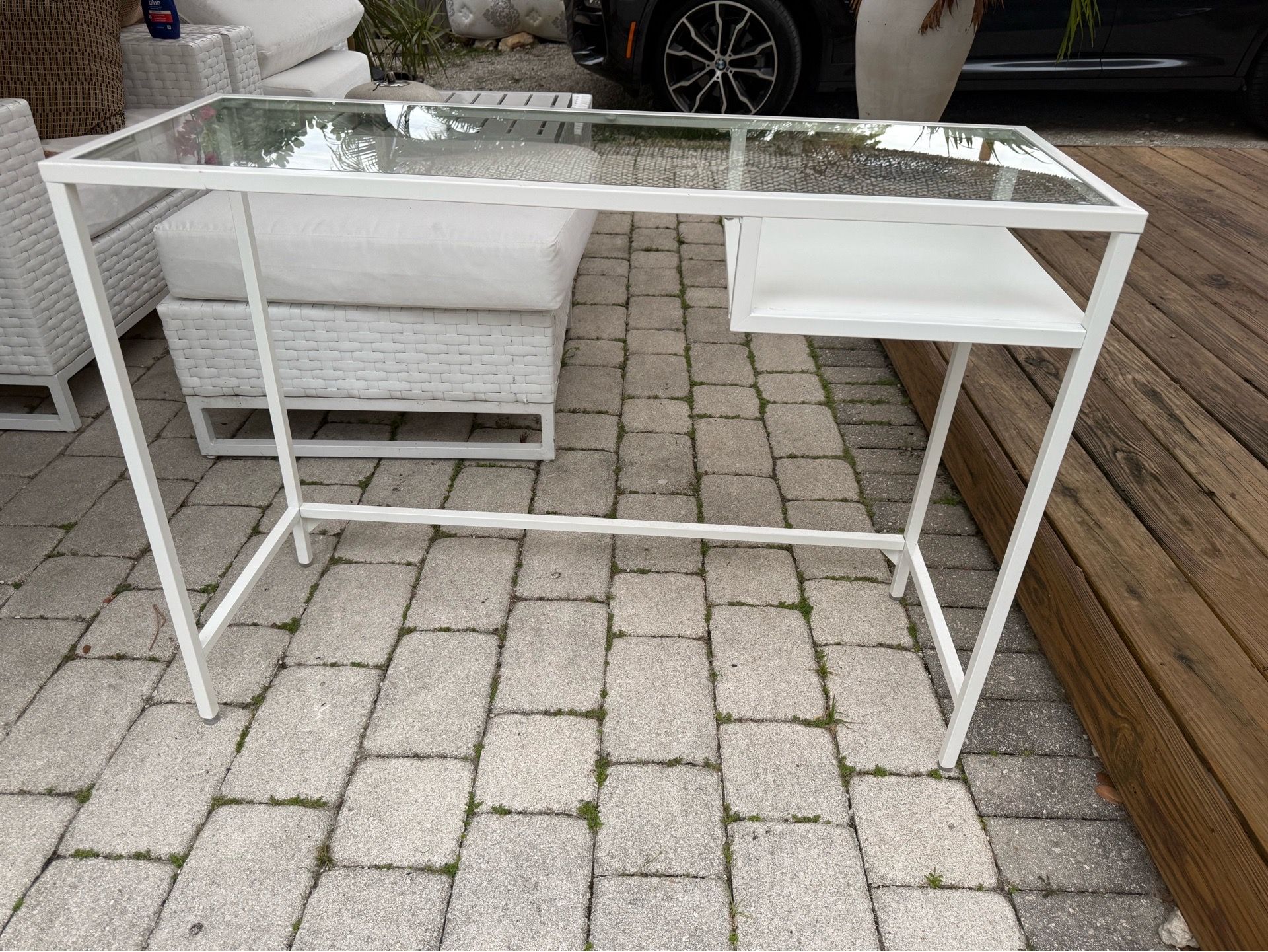 Small laptop White and glass desk.