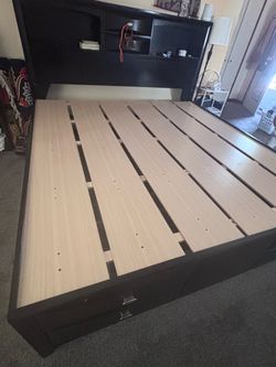 Wooden bed frame  california mattress sized