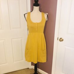 Yellow knit dress with front pockets
