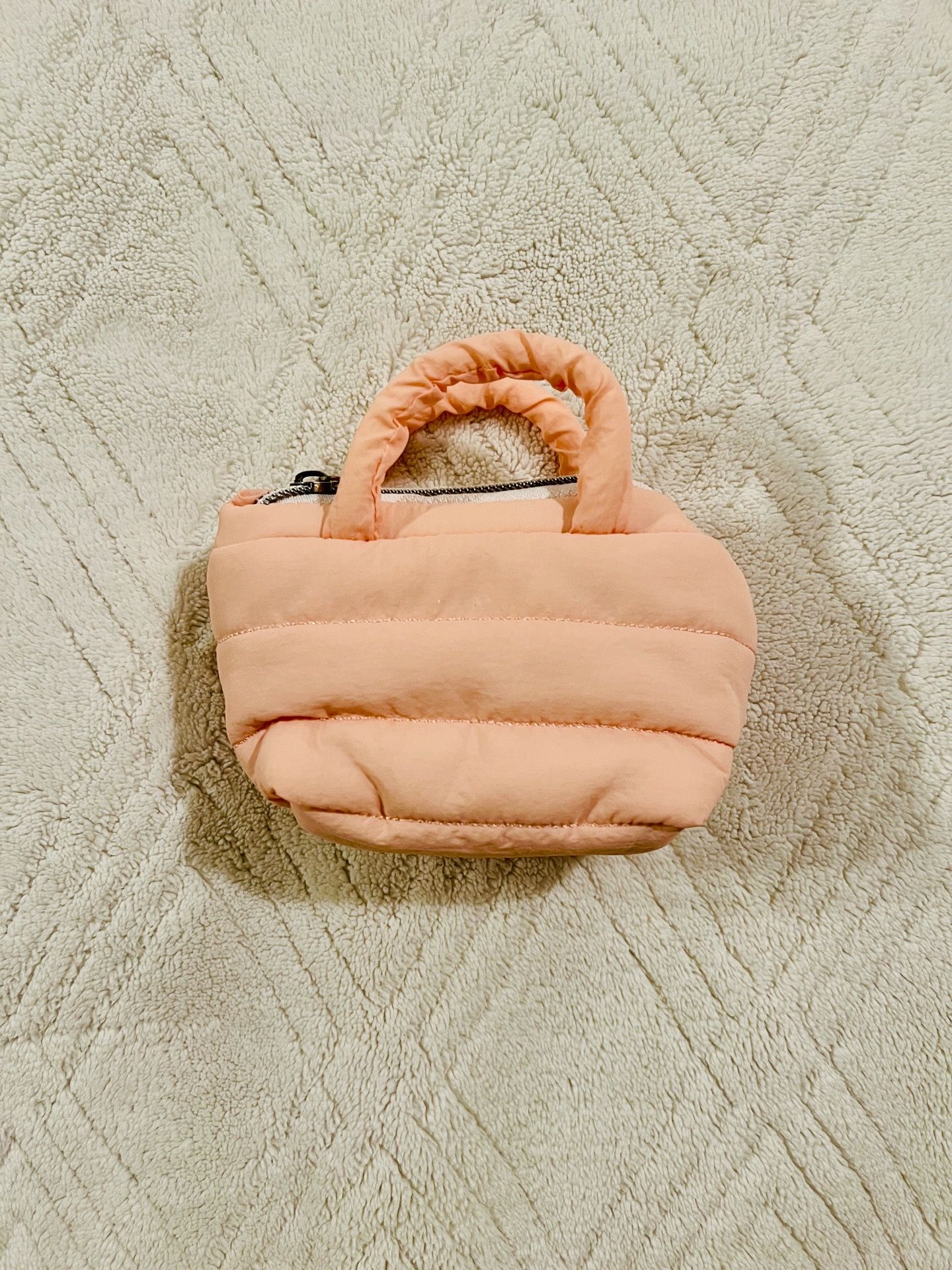 light pink puffy mini purse