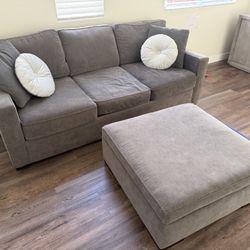 Grey Sofa bed And Ottoman In Very Good Condition. 