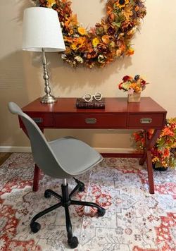 Red Desk and Gray Chair