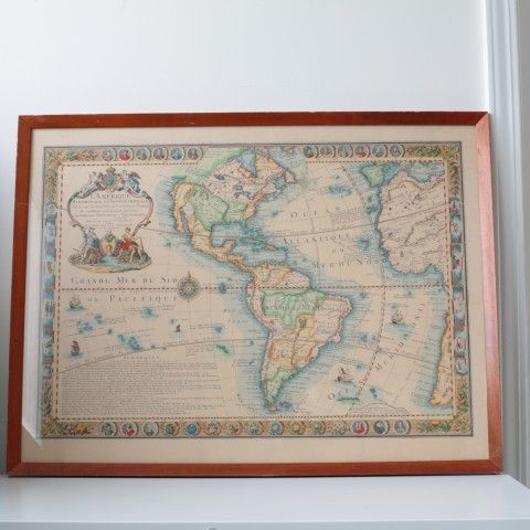 Framed 1731 “L'Amerique Meridionale et Septentrionale” antique map