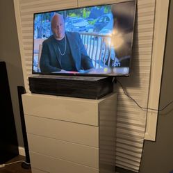 45 Inch TV & White Dresser 