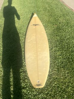 Surfboard. About 61. Looking to get rid of it.