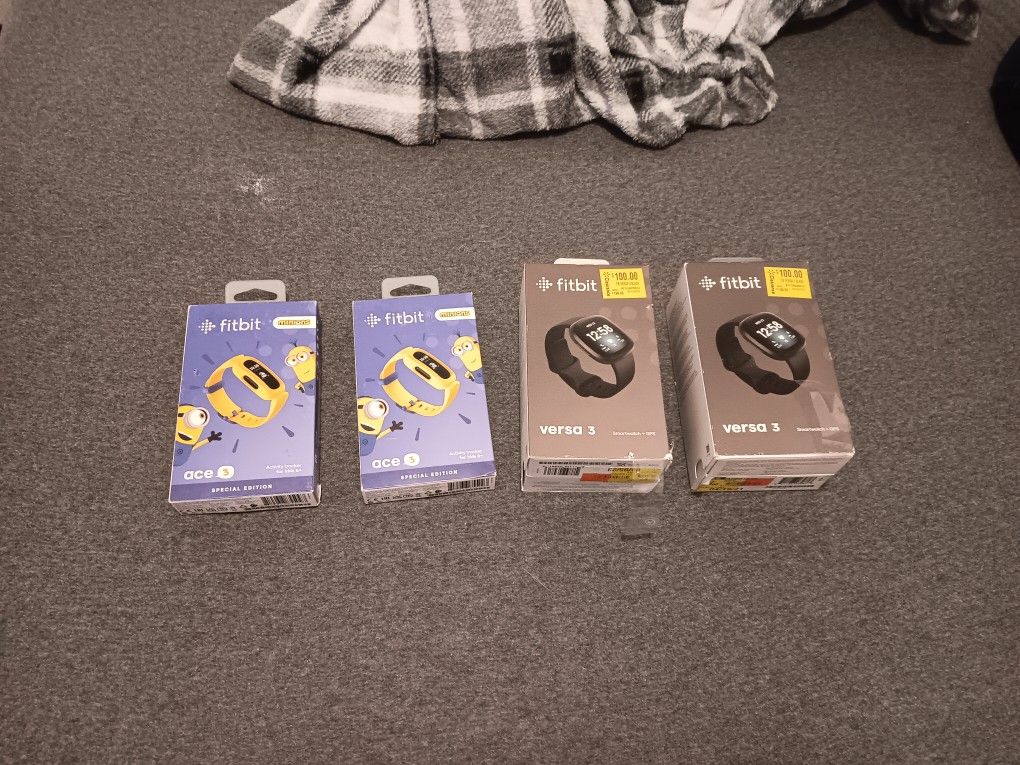 Fitbit watches for adults and kids. New Unopened