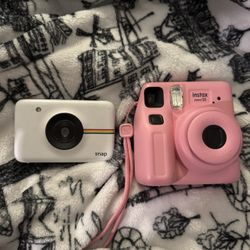 Polaroid Cameras Bundle . Pink Instax Mini SE, And A White Polaroid Snap.  
