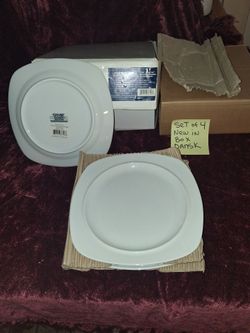 Four-piece dansk accent plates new in the box.. all sales final.