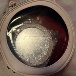 Rare Beauty pink round/circular bag