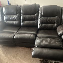 Dark brown leather Reclining Sofa And Love Seat 