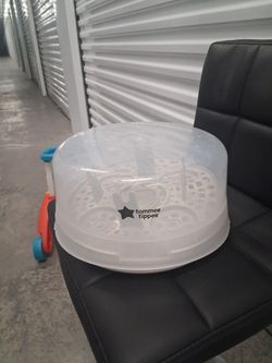 Baby bottle steamer holder