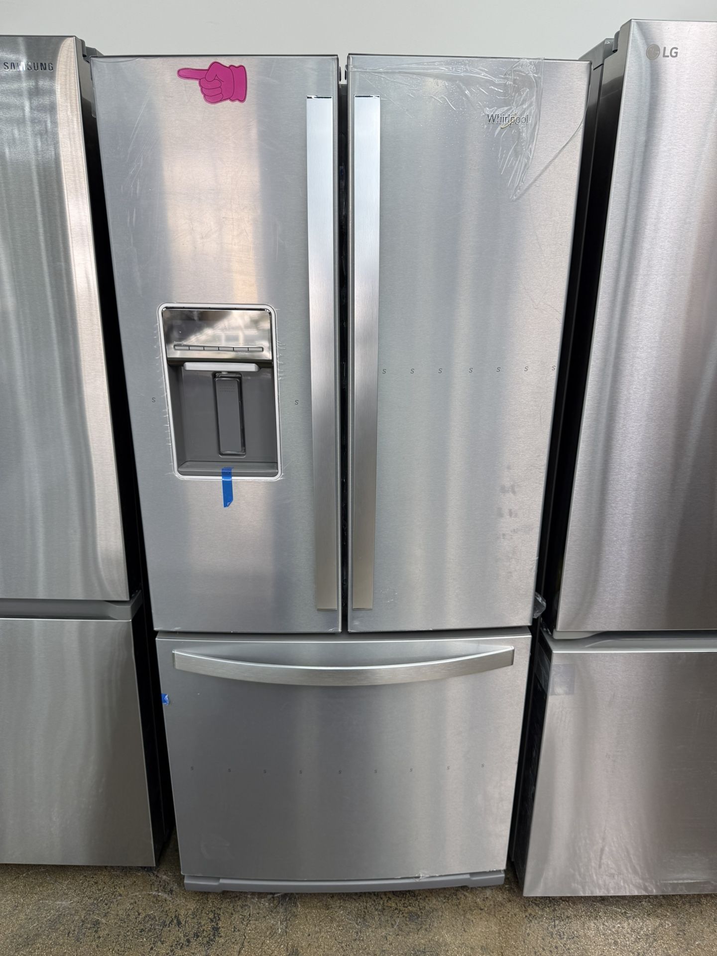 Brand new Whirlpool stainless steel french door refrigerator 33 inches
