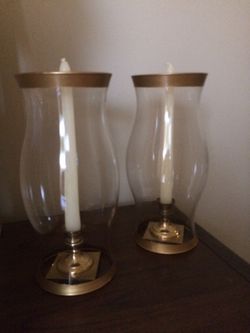 Brass candle sticks in glass 10”