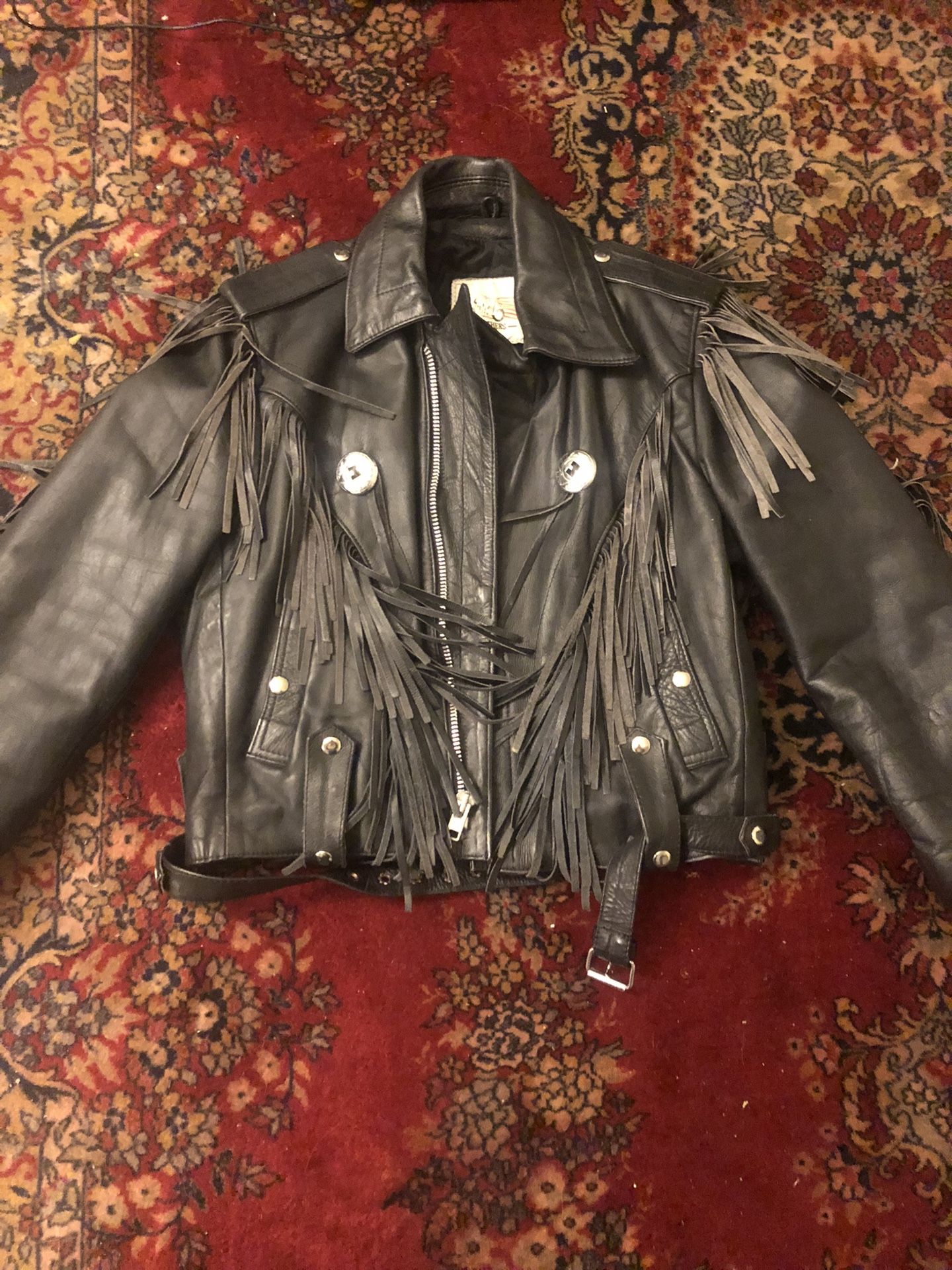 Fringed woman’s leather jacket by Fureal ltd. Size 36.