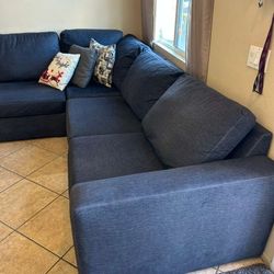 Large And Beautiful Dark Blue Sectional Couch From LIVING SPACES LIKE NEW!!
