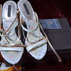 GOOD CONDITIONS " AUTHENTIC LOUIS VUITTON SIZE 7 HEELS WITH REPLACEMENT HEEL TIPS 75$