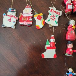 50 miniature wooden ornaments. Approx 1"